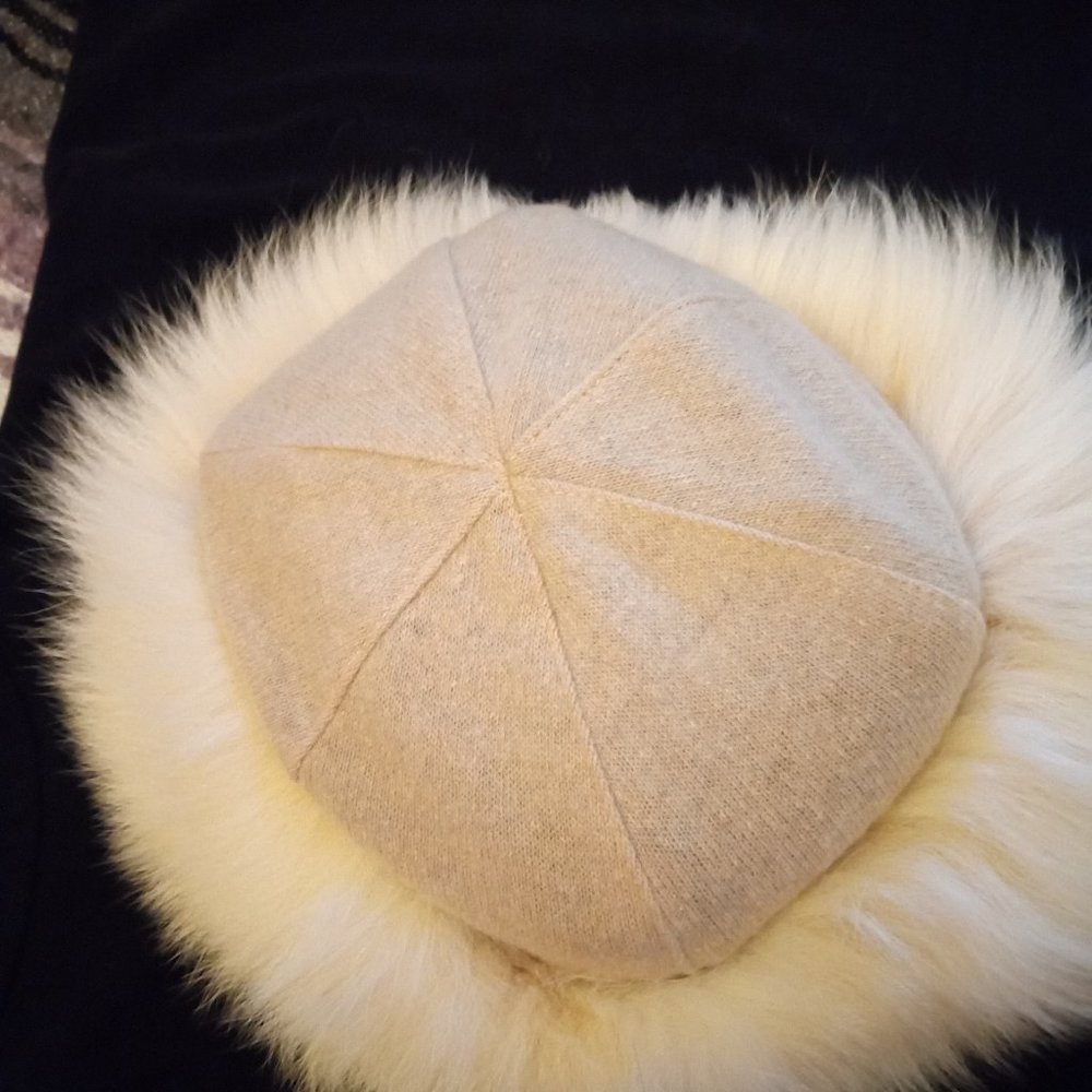 Fur trimmed lady's hat.